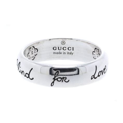 blind for love gucci ring meaning